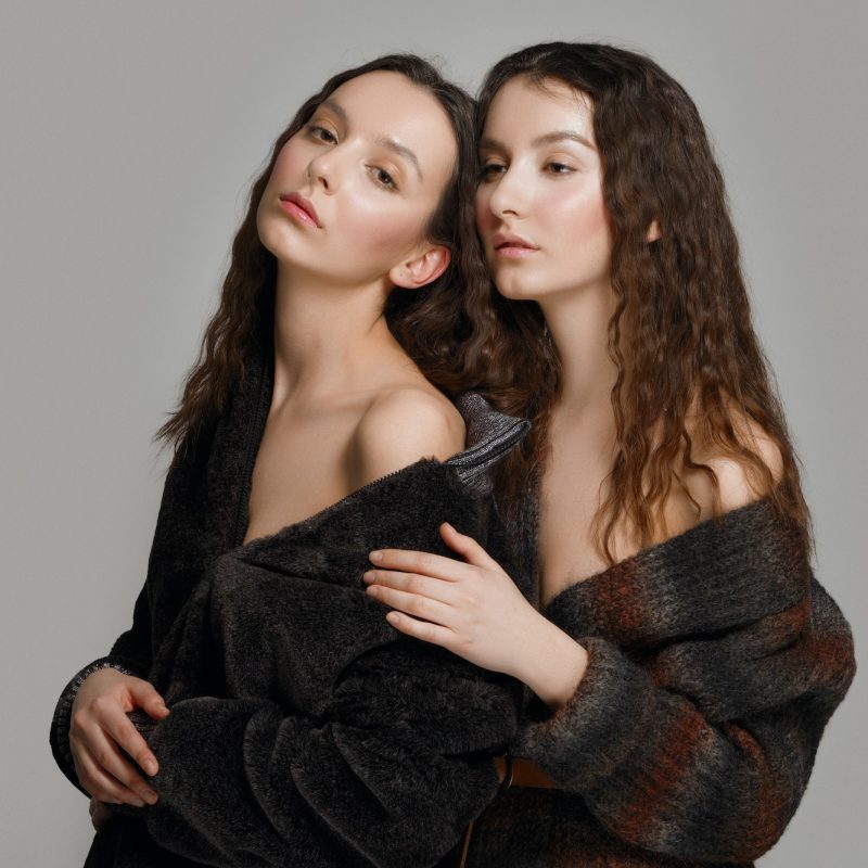 young-fashion-model-in-knitted-woolen-coat-posing.jpg